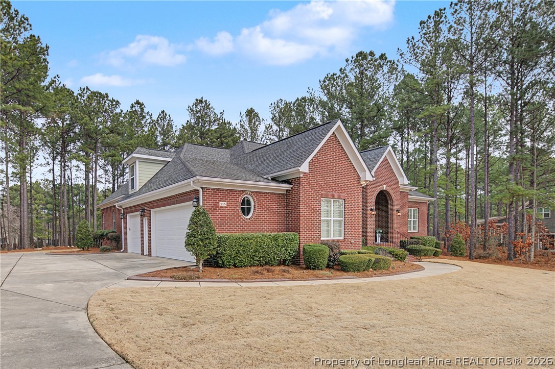 115 Micahs Way North Spring Lake, NC 28390 - Photo 7 of 39 front view of a house with a yard