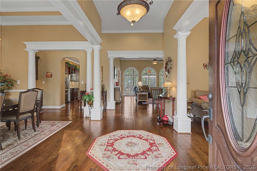 115 Micahs Way North Spring Lake, NC 28390 - Photo 8 of 39 a living room with furniture and a floor to ceiling window