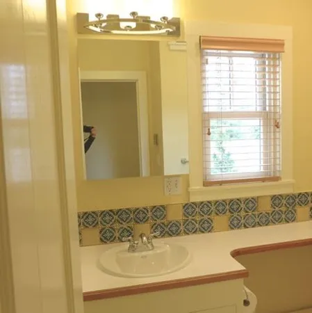 a bathroom with a bathtub and a sink