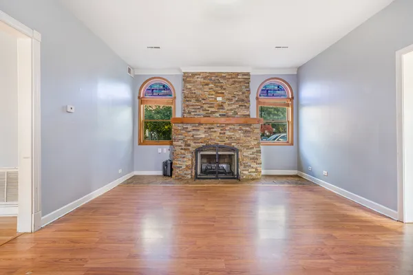 a view of a room with window and fireplace