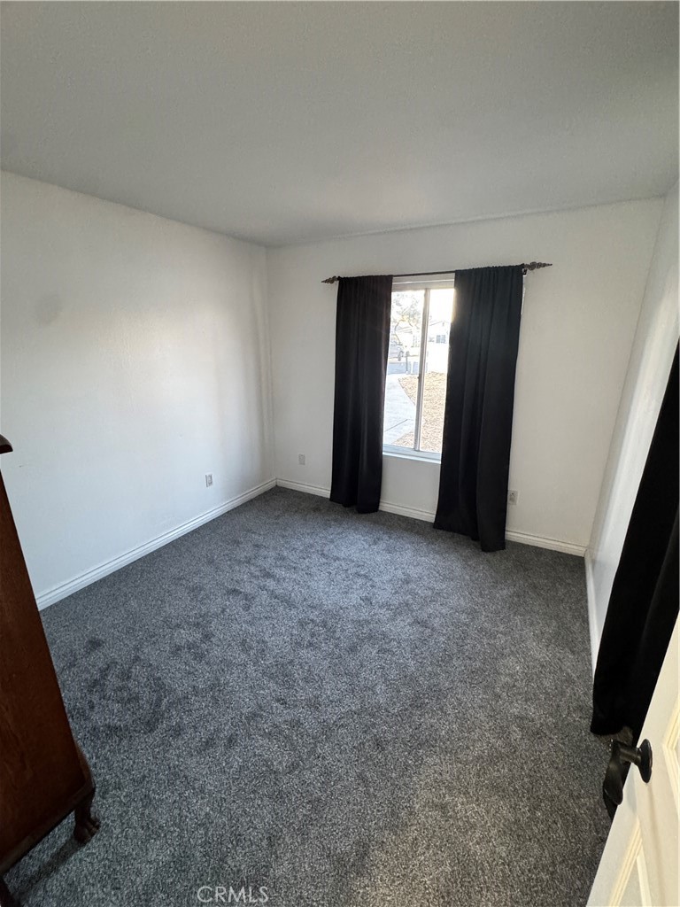 40471 Rome Beauty Way Cherry Valley, CA 92223 - Photo 19 of 32 an empty room with a window