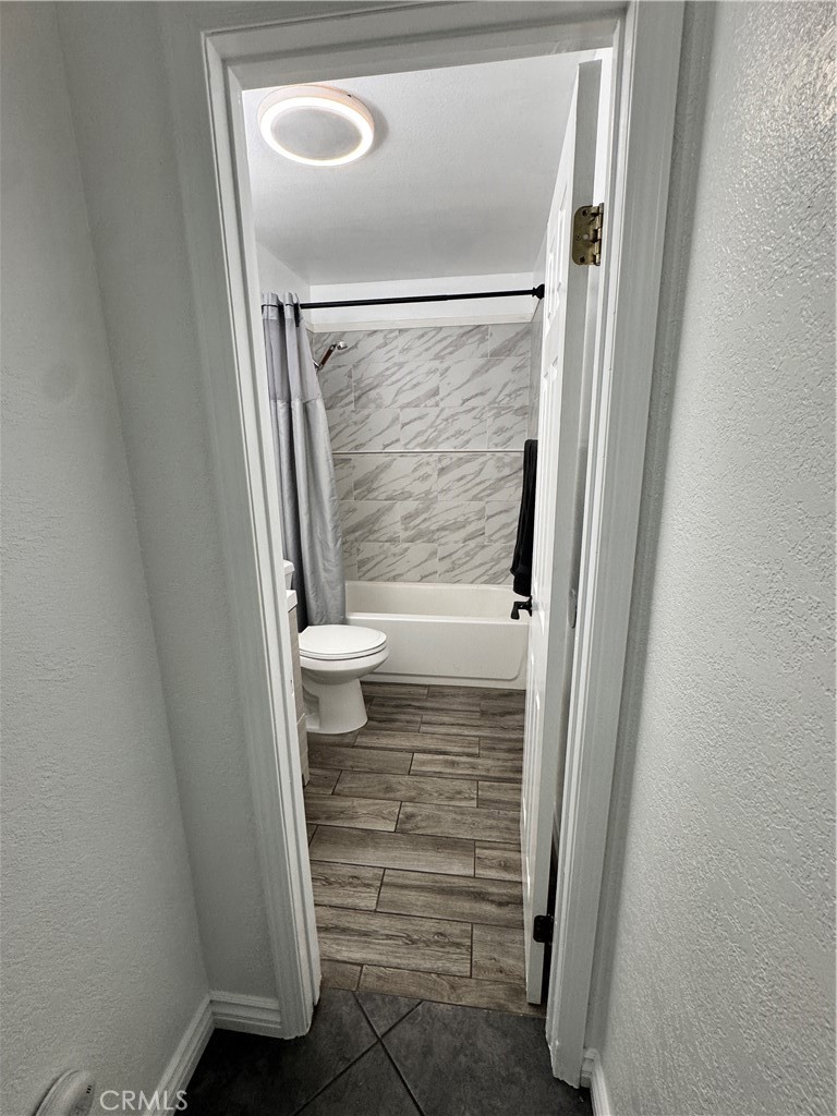 40471 Rome Beauty Way Cherry Valley, CA 92223 - Photo 21 of 32 a bathroom with a granite countertop sink and a mirror