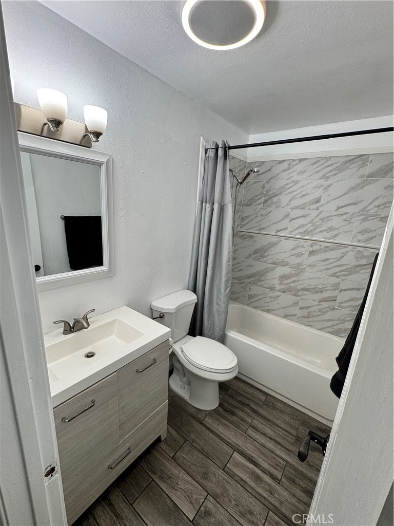 40471 Rome Beauty Way Cherry Valley, CA 92223 - Photo 22 of 32 a bathroom with a sink a toilet and shower