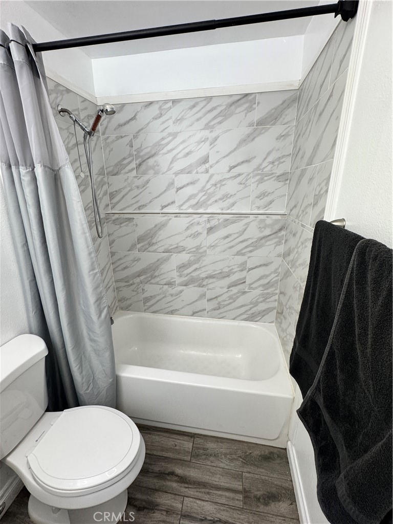 40471 Rome Beauty Way Cherry Valley, CA 92223 - Photo 23 of 32 a bathroom with a toilet and a shower