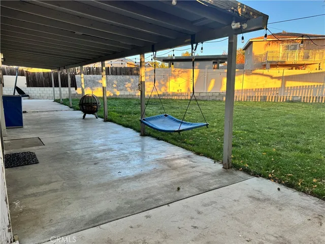 a backyard of a house with seating space