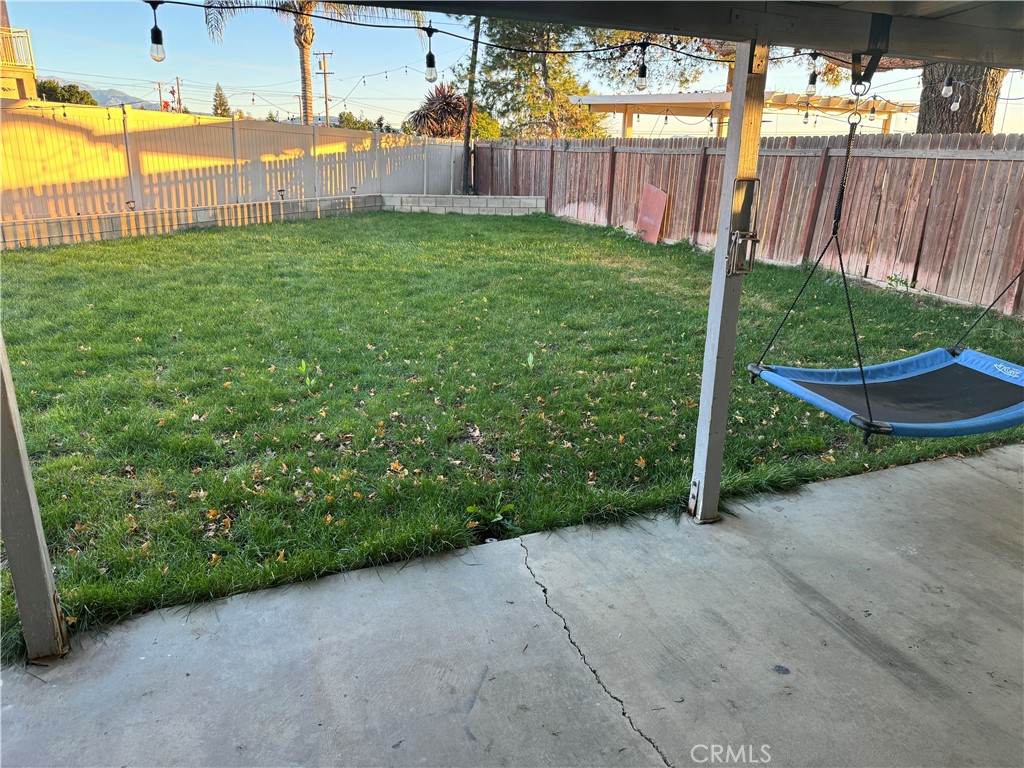 40471 Rome Beauty Way Cherry Valley, CA 92223 - Photo 27 of 32 a view of a backyard with a garden