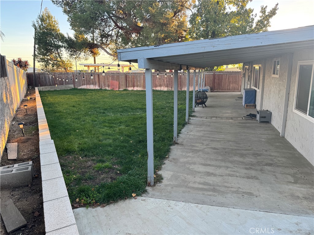 40471 Rome Beauty Way Cherry Valley, CA 92223 - Photo 30 of 32 a view of a backyard with garden