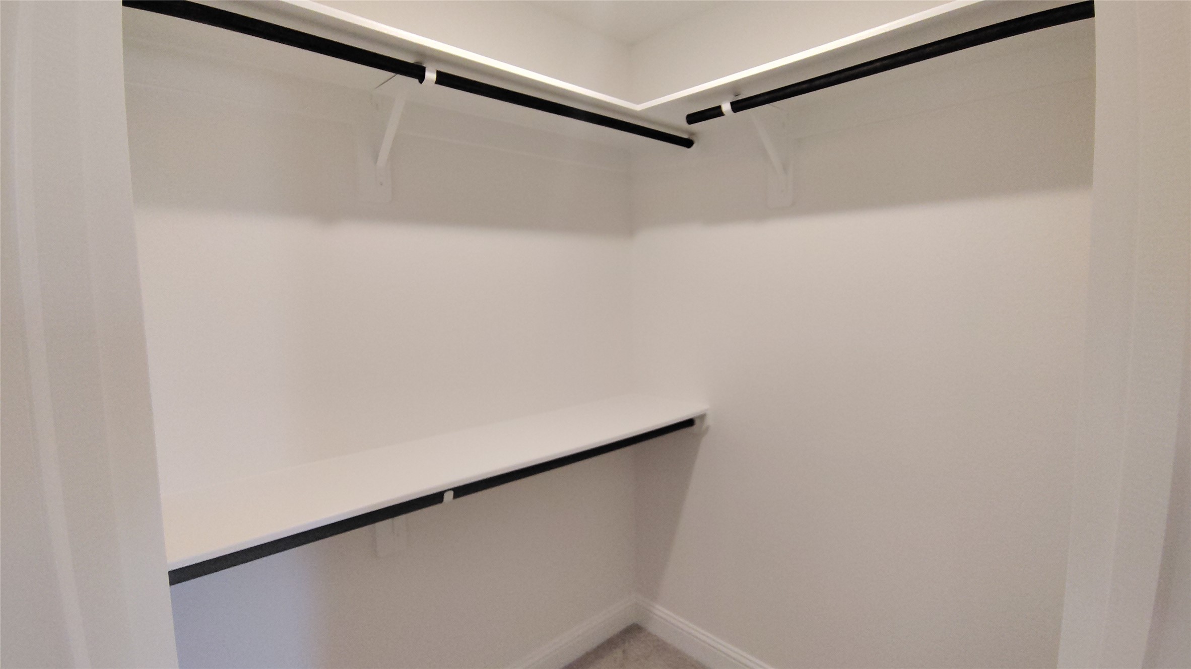 644 Greystone Lane Angleton, TX 77515 - Photo 15 of 21 a view of a refrigerator in a white wall