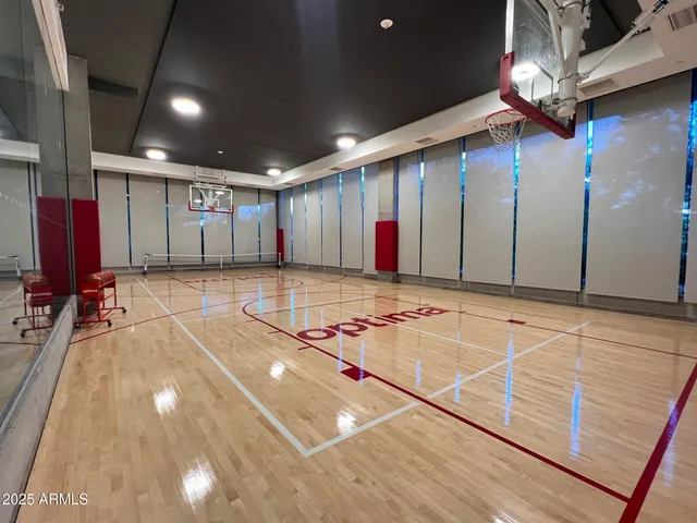 a room with gym equipment and a large window