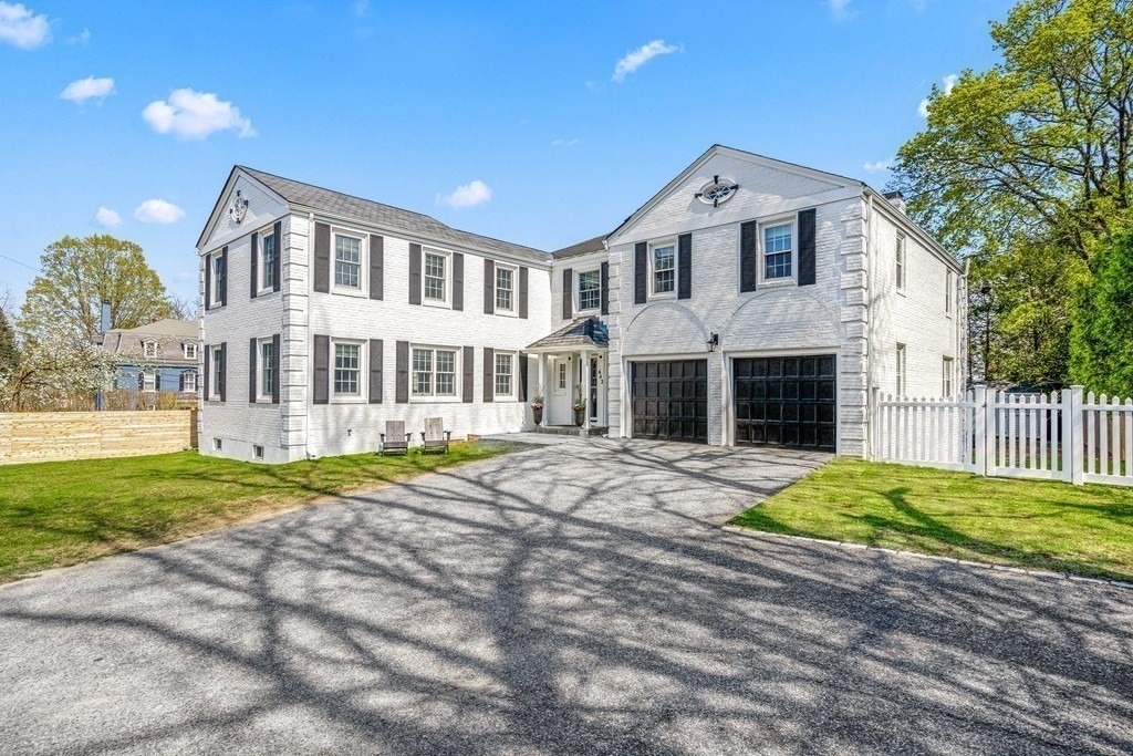 642 Centre Street Newton, MA 02458 - Photo 1 of 26 a front view of a house with a yard