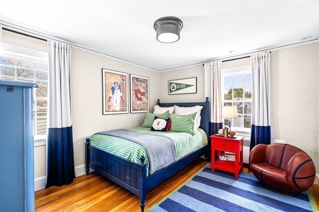 642 Centre Street Newton, MA 02458 - Photo 18 of 26 a bedroom with a bed and window