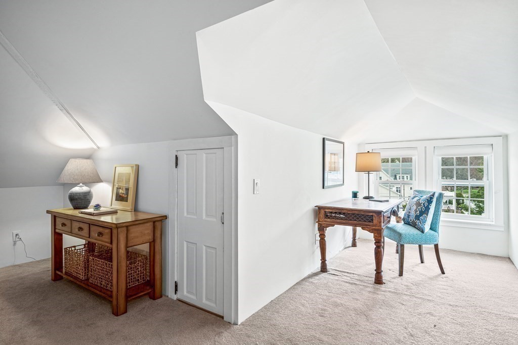642 Centre Street Newton, MA 02458 - Photo 21 of 26 a work room with furniture and a potted plant