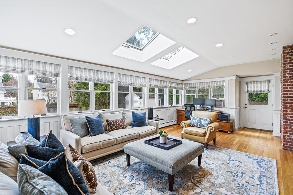 642 Centre Street Newton, MA 02458 - Photo 5 of 26 a living room with furniture and a large window