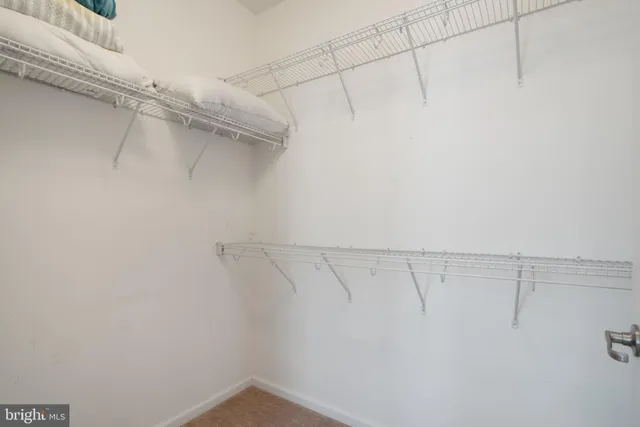 a view of a room with racks on the wall