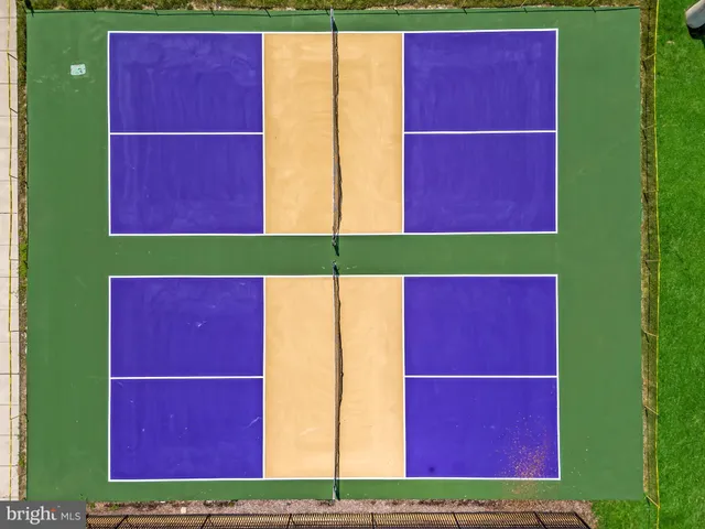 a view of a red door and small yard