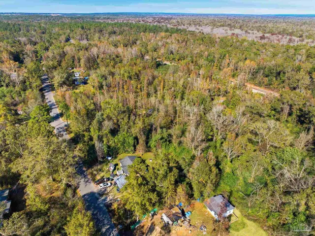 a view of a field with an outdoor space