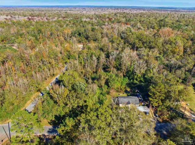 a view of a field with an outdoor space