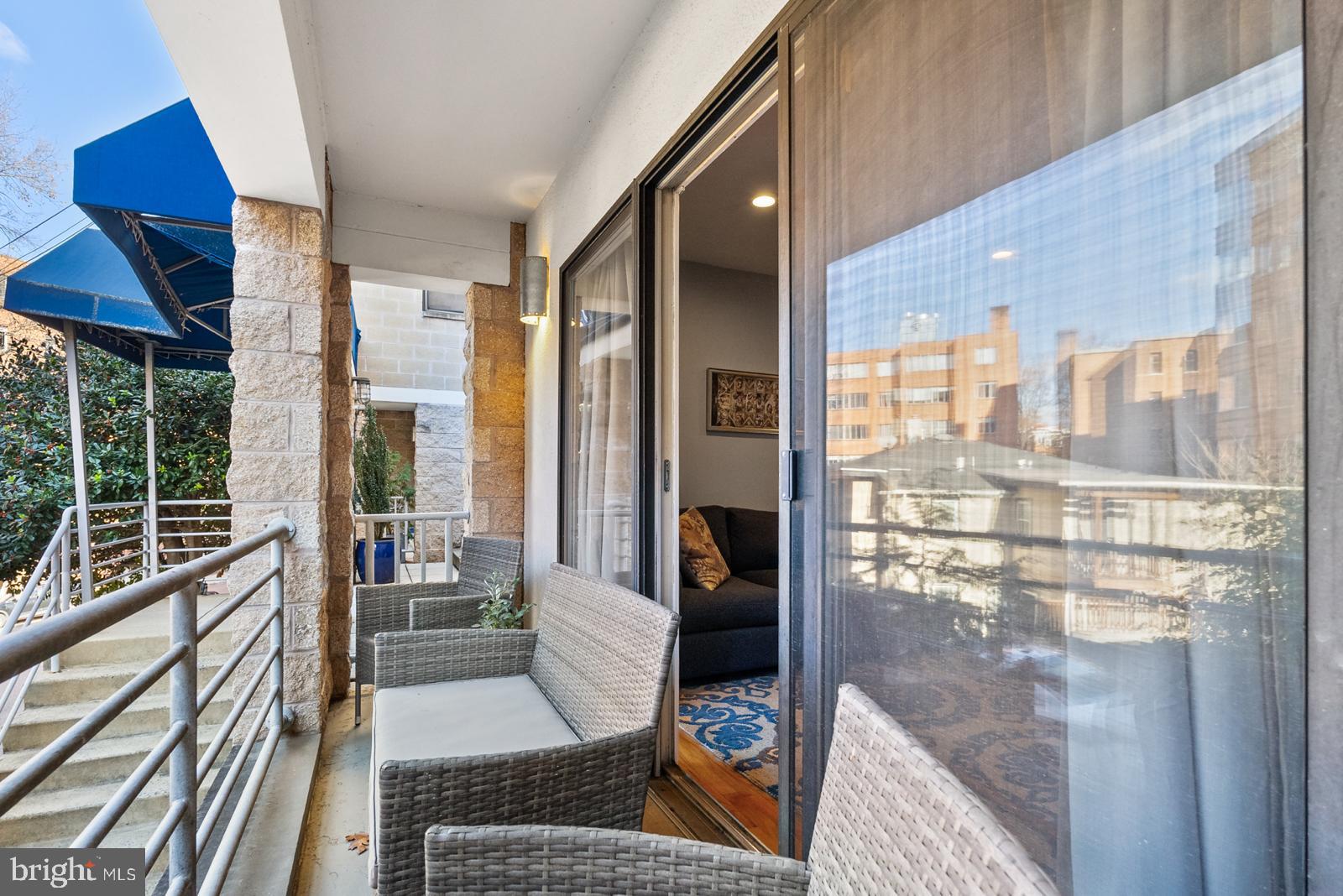 1710 Summit Place Northwest, Unit 1710 Washington, DC 20009 - Photo 22 of 35 a living room with furniture