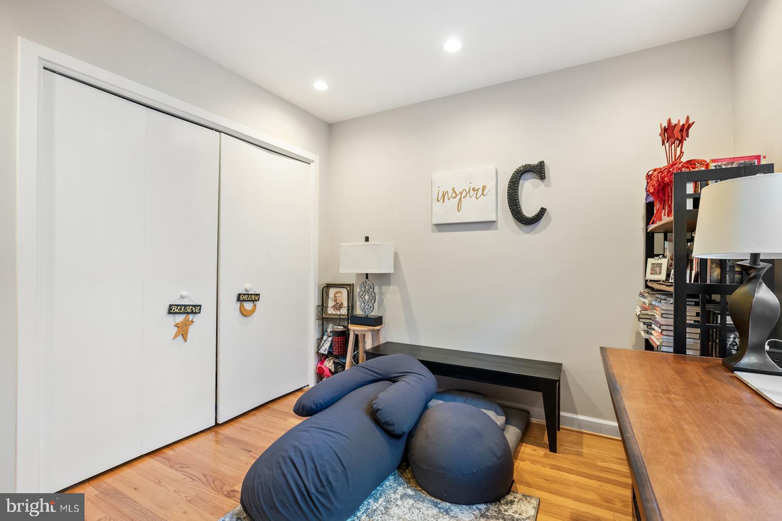 1710 Summit Place Northwest, Unit 1710 Washington, DC 20009 - Photo 24 of 35 a living room with furniture