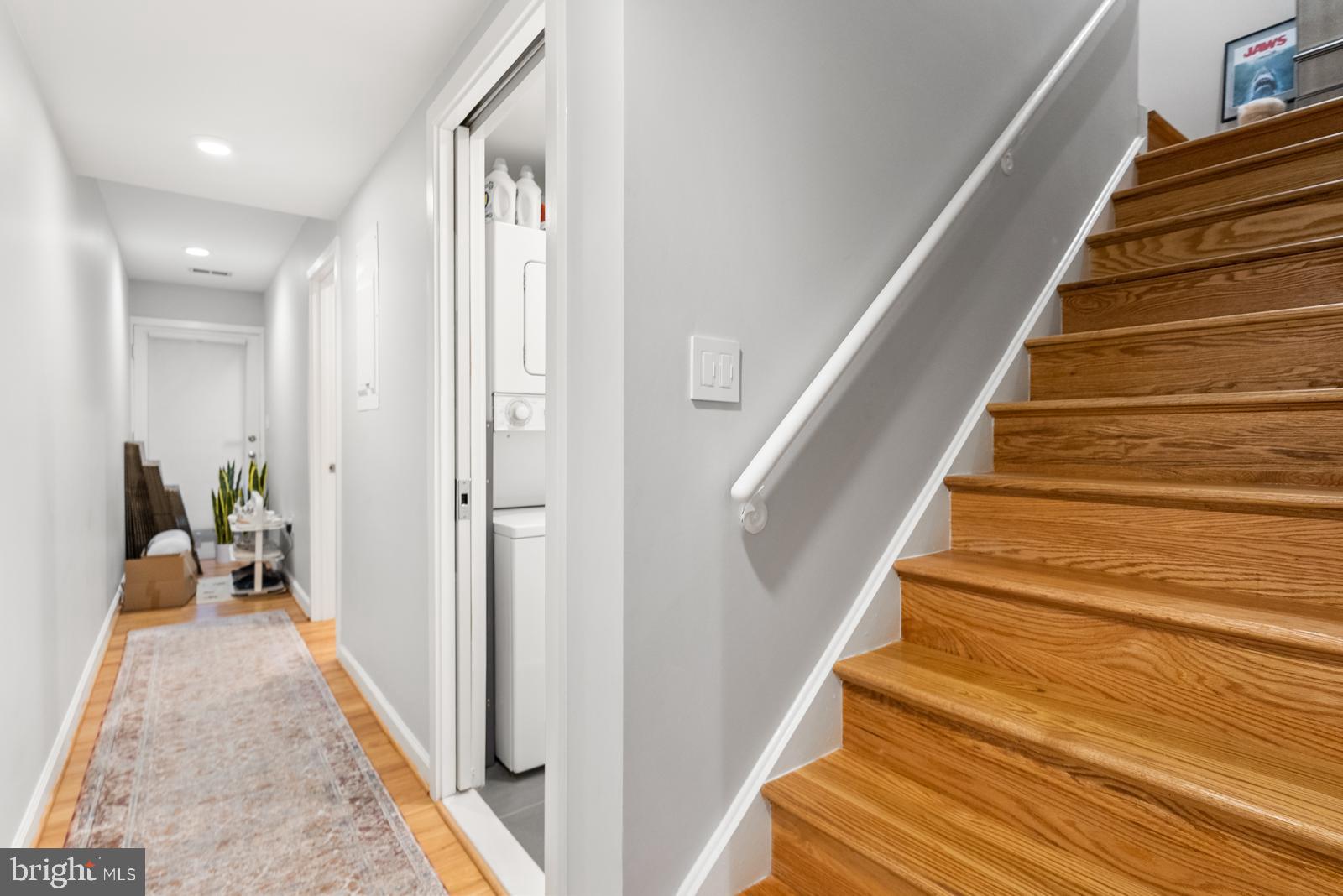1710 Summit Place Northwest, Unit 1710 Washington, DC 20009 - Photo 9 of 35 a view of entryway and hall with wooden floor