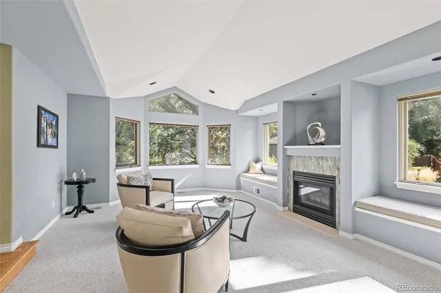 a work room with furniture and windows