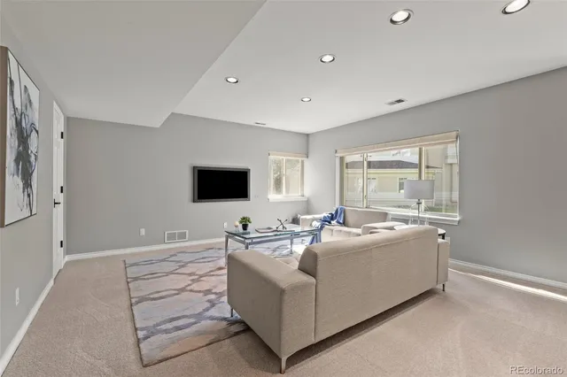 a room with furniture and a fireplace