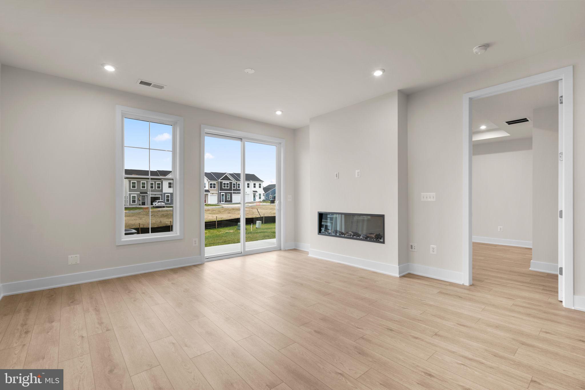 108 Keystone Winchester, VA 22603 - Photo 13 of 46 a view of a big room with wooden floor and windows
