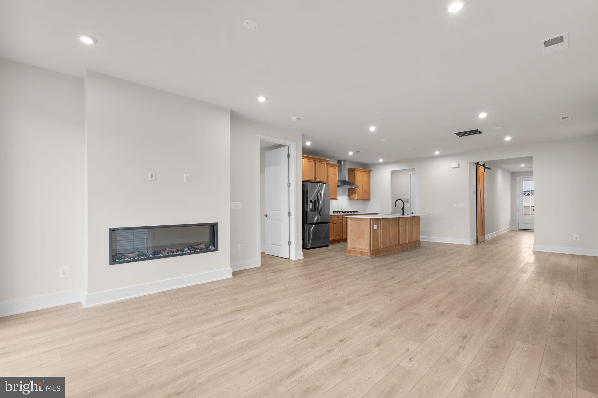 108 Keystone Winchester, VA 22603 - Photo 14 of 46 a view of a kitchen with a sink and a refrigerator