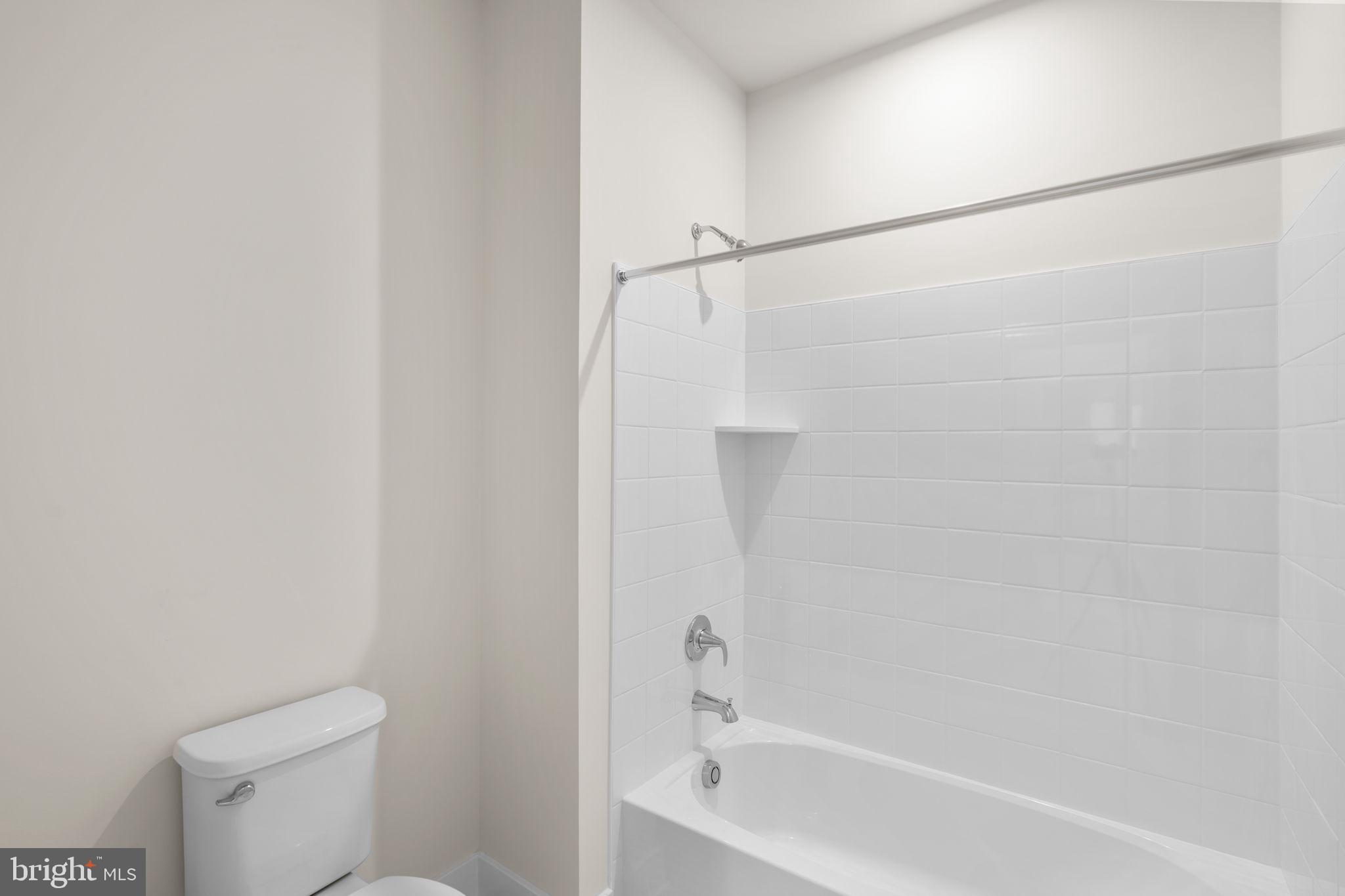 108 Keystone Winchester, VA 22603 - Photo 35 of 46 a bathroom with a bathtub and a toilet