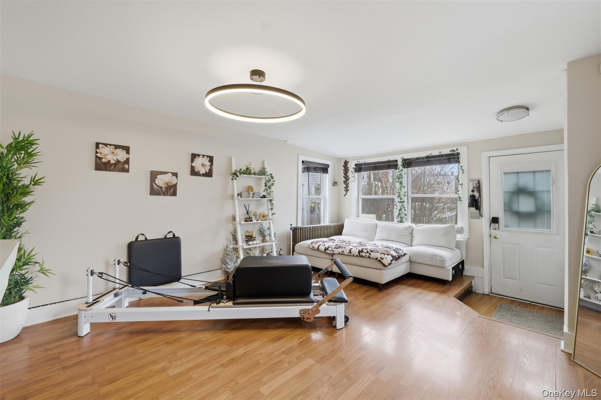 121 Little Britain Road Newburgh, NY 12550 - Photo 4 of 15 a living room with furniture and wooden floor