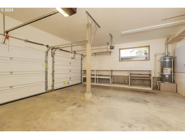 a view of a room with storage and utility room