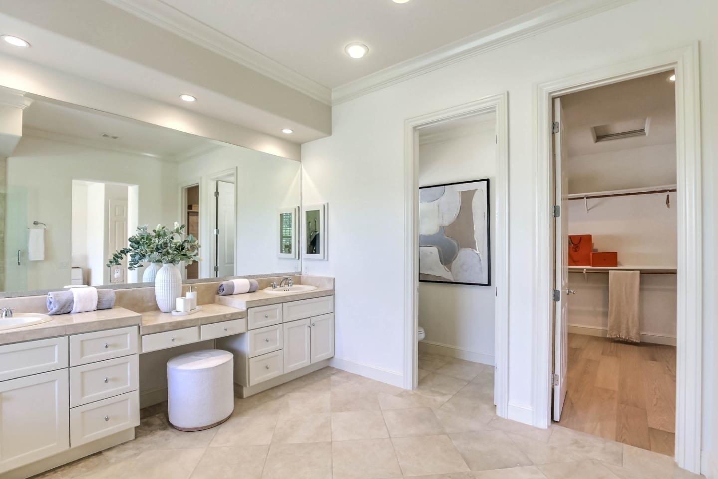 20455 Franklin Avenue Saratoga, CA 95070 - Photo 21 of 44 a bathroom with a sink a toilet and mirror