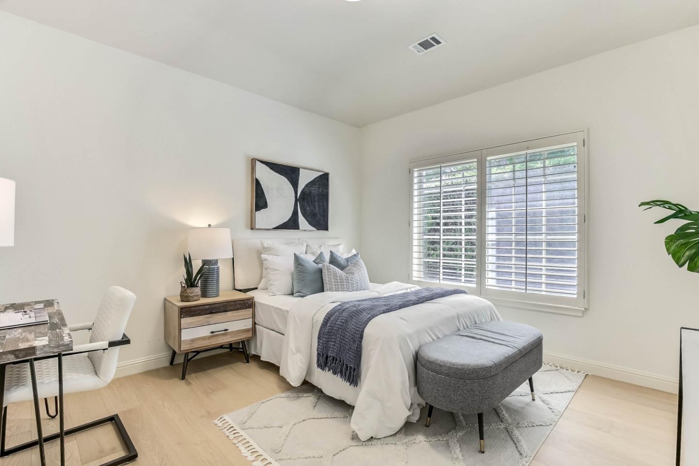 20455 Franklin Avenue Saratoga, CA 95070 - Photo 22 of 44 a bedroom with a bed and a window