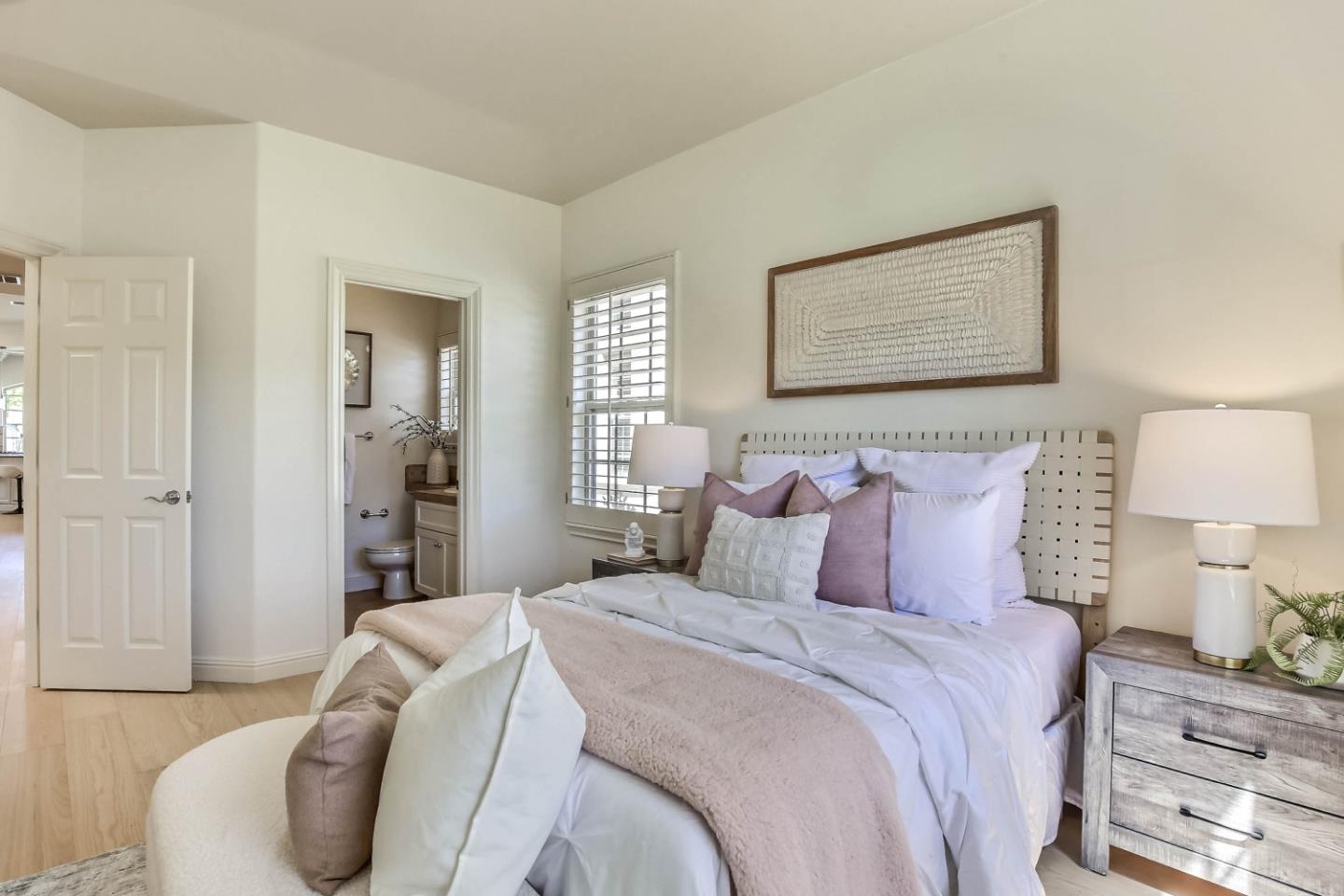 20455 Franklin Avenue Saratoga, CA 95070 - Photo 26 of 44 a bedroom with a bed and a lamp