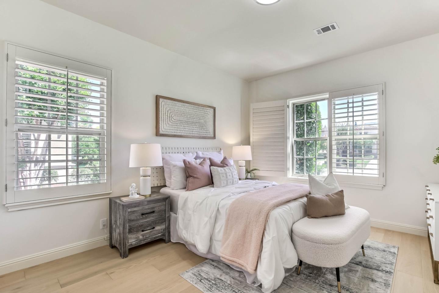 20455 Franklin Avenue Saratoga, CA 95070 - Photo 27 of 44 a bedroom with a bed and a large window