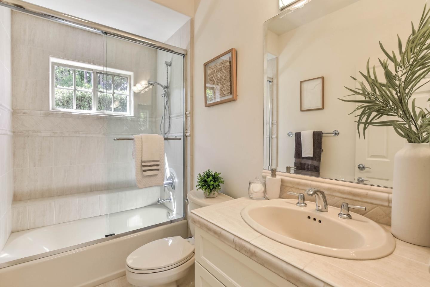 20455 Franklin Avenue Saratoga, CA 95070 - Photo 31 of 44 a bathroom with a sink toilet and shower