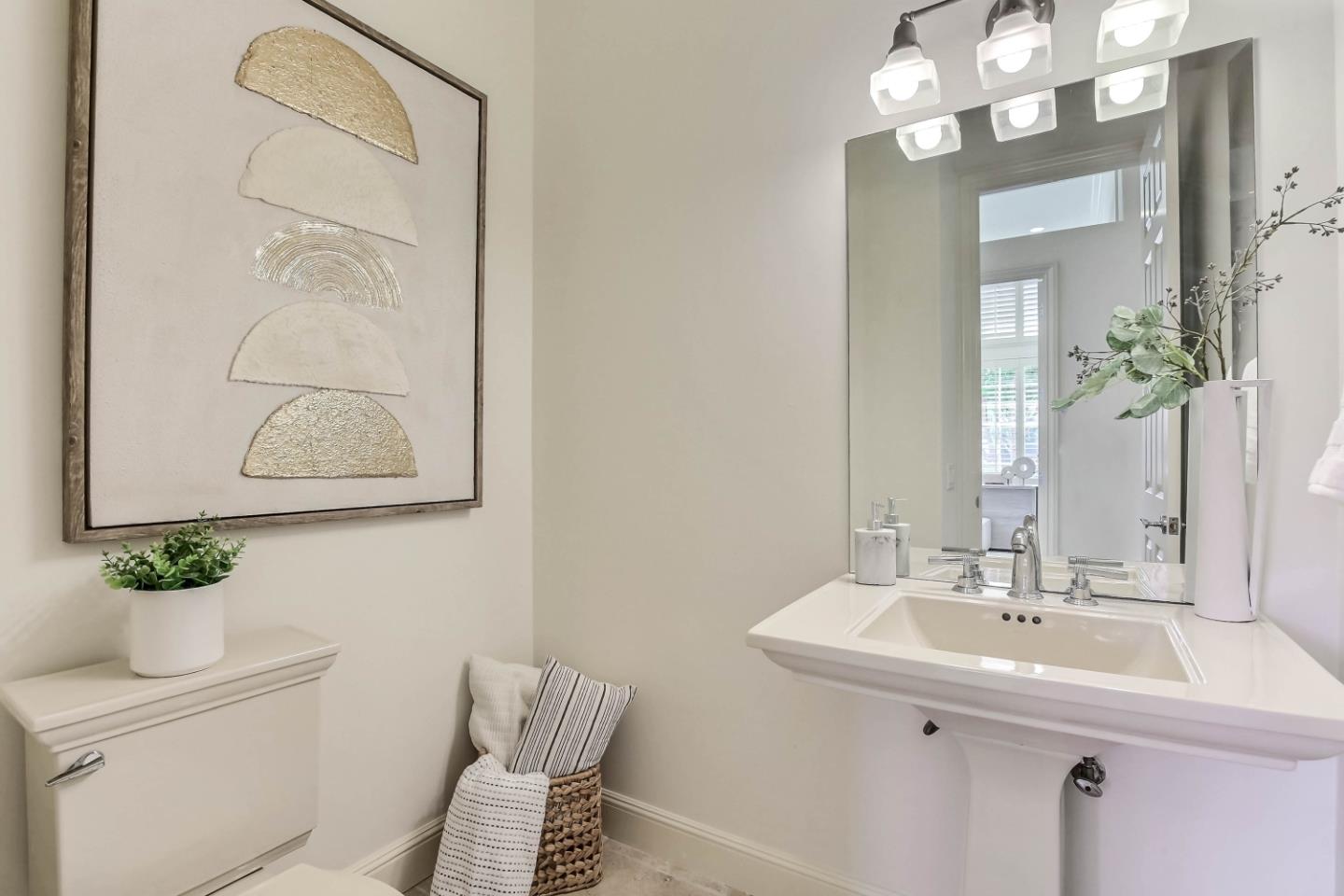 20455 Franklin Avenue Saratoga, CA 95070 - Photo 32 of 44 a bathroom with a sink vanity and a mirror