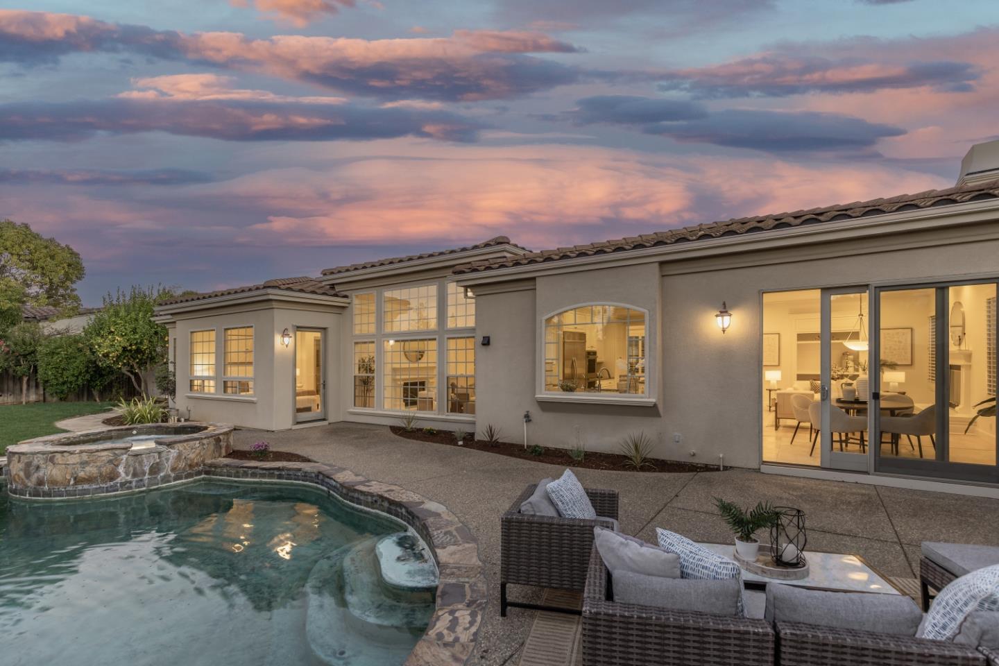 20455 Franklin Avenue Saratoga, CA 95070 - Photo 35 of 44 a swimming pool with outdoor seating and yard