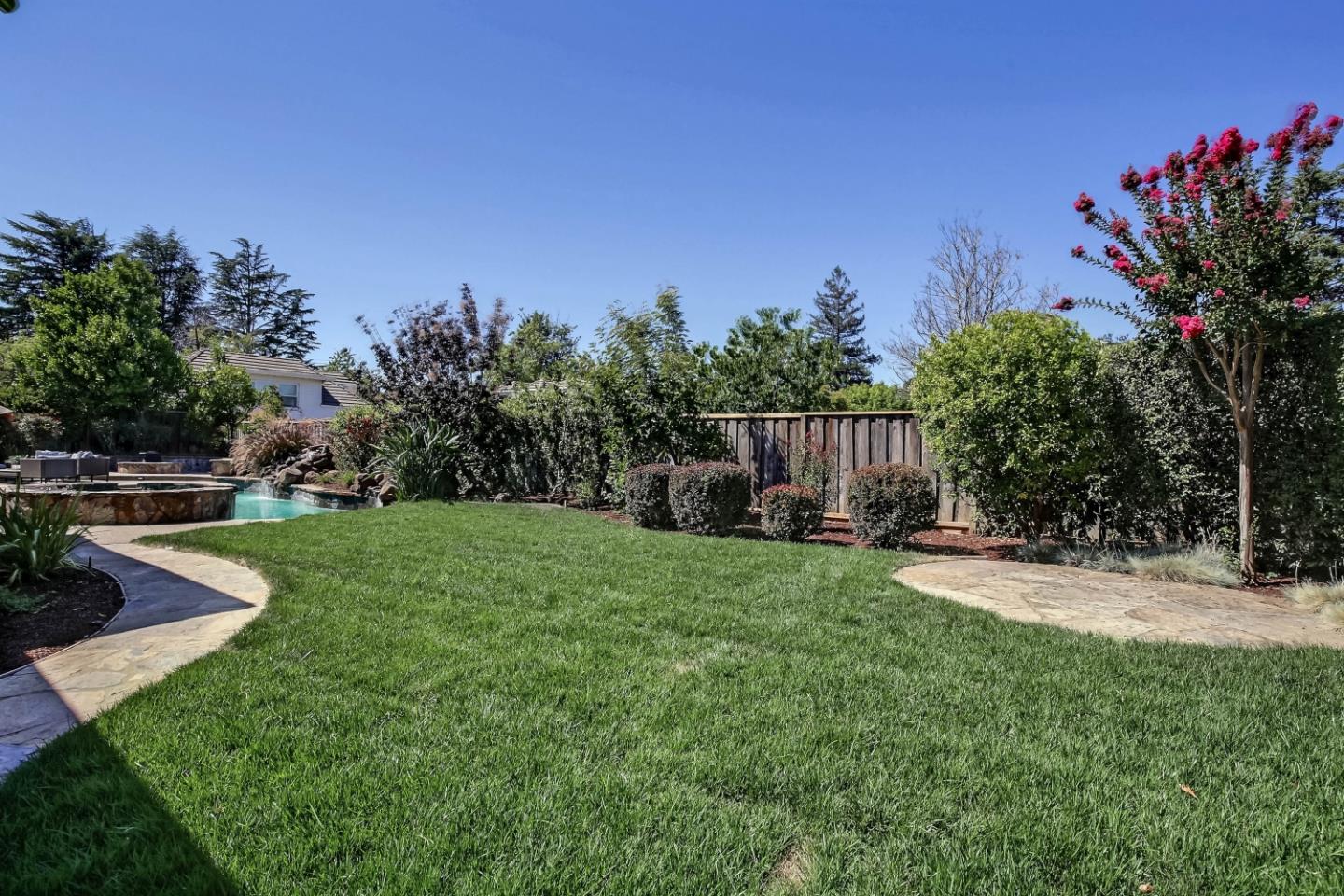 20455 Franklin Avenue Saratoga, CA 95070 - Photo 42 of 44 a view of a house with backyard and a tree