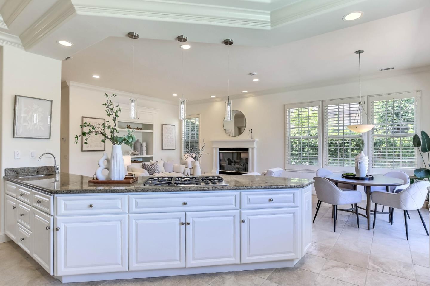 20455 Franklin Avenue Saratoga, CA 95070 - Photo 10 of 44 a spacious kitchen with granite countertop a sink and cabinets