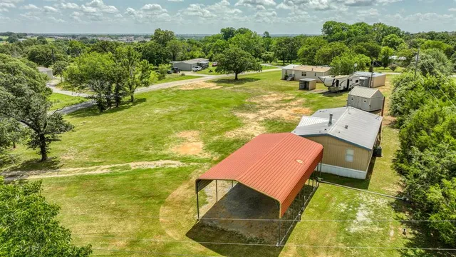 $297,999 | 221 Briar Oaks Drive, Azle, TX 76020