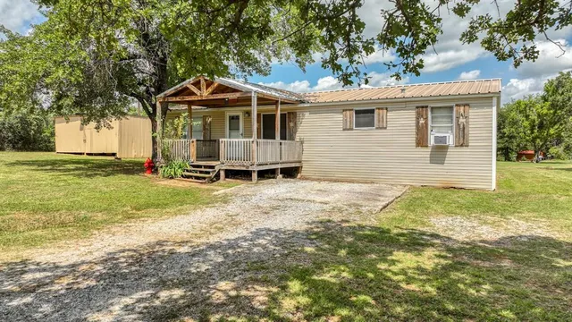 $297,999 | 221 Briar Oaks Drive, Azle, TX 76020