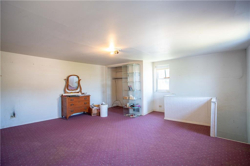 1698 Old Brodhead Road Monaca, PA 15061 - Photo 15 of 34 an empty room with windows and couch