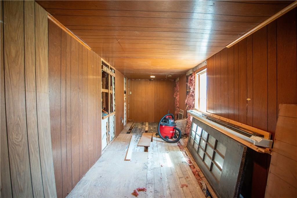 1698 Old Brodhead Road Monaca, PA 15061 - Photo 20 of 34 a view of a hallway with window and wooden floor