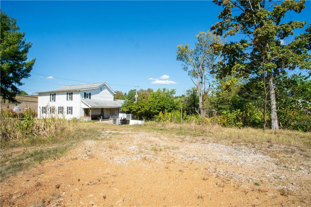 1698 Old Brodhead Road Monaca, PA 15061 - Photo 31 of 34 a front view of a house with a yard