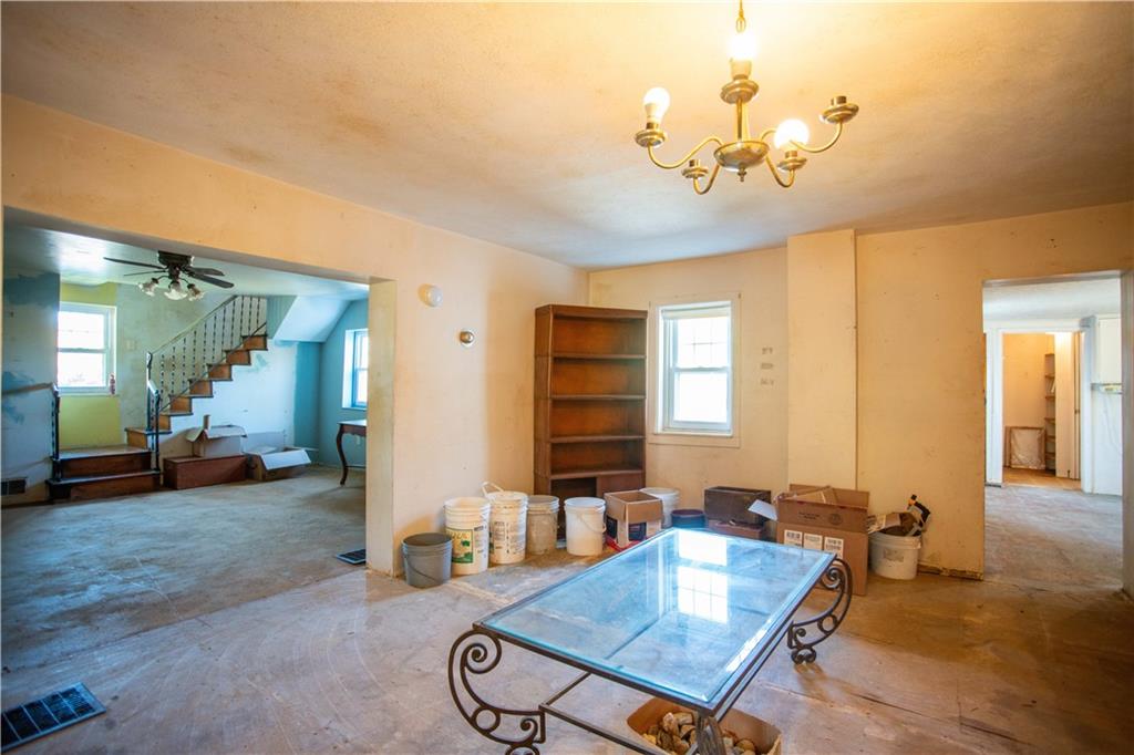 1698 Old Brodhead Road Monaca, PA 15061 - Photo 8 of 34 a view of a dining room with furniture window and wooden floor
