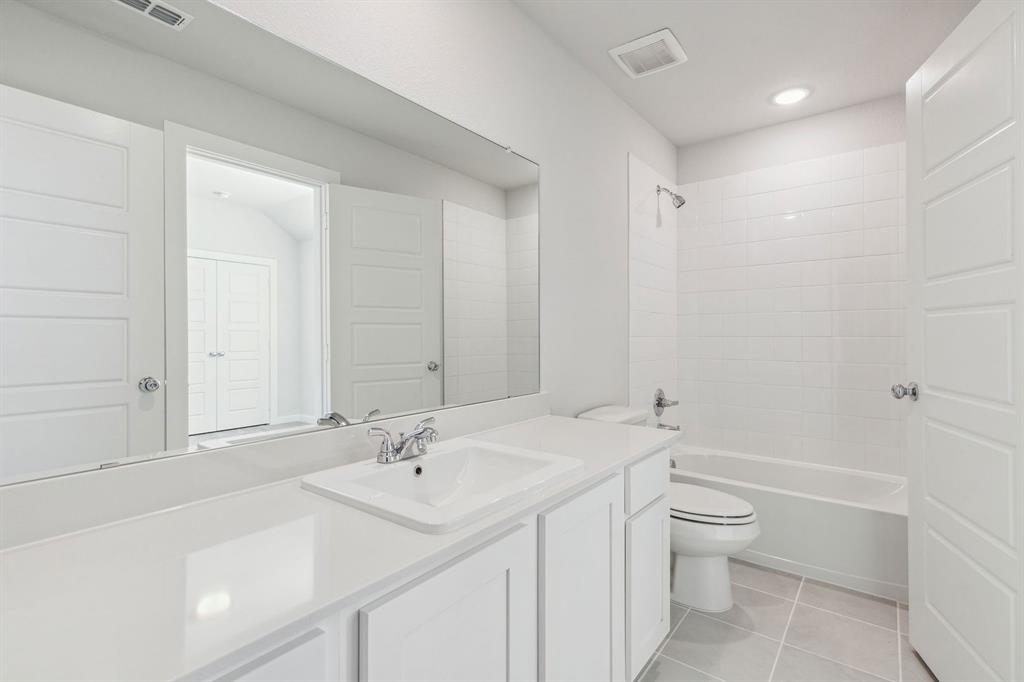 880 Sunflower Road Lavon, TX 75166 - Photo 26 of 31 Bathroom in the Willow home plan by Trophy Signature Homes – REPRESENTATIVE PHOTO