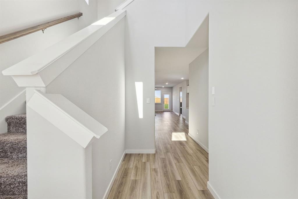 880 Sunflower Road Lavon, TX 75166 - Photo 29 of 31 Entryway in the Willow home plan by Trophy Signature Homes – REPRESENTATIVE PHOTO