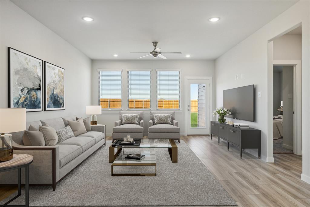 880 Sunflower Road Lavon, TX 75166 - Photo 9 of 31 Living Room in the Willow home plan by Trophy Signature Homes – REPRESENTATIVE PHOTO
