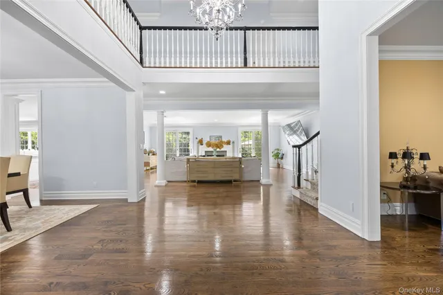 a view of an entryway and livingroom with furniture
